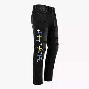 Black distressed streetwear jeans with colorful cross graphics (white, blue, yellow) on the leg, featuring rips and a slim-fit silhouette